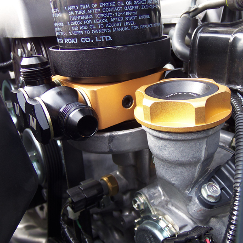 Mishimoto Oil Sandwich Plate with Rear-Mounted Thermostat for Enhanced Engine Cooling and Warm-Up Control - Image 3